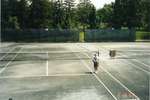 Marten Johnston Watering Waterloo Tennis Club Courts