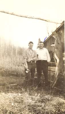 Men with Deer Carcass