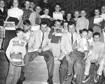 Whitby Dunlops with Group of Children, 1957