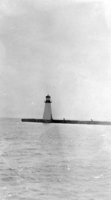 Lighthouse and West Pier, c. 1930