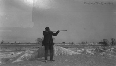 Unidentified Man Shooting a Rifle, c.1915