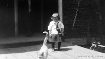 Unidentified Child and Cat, c.1915