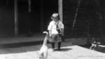 Unidentified Child and Cat, c.1915