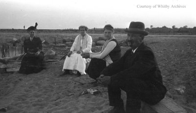 Unidentified Group Sitting at the Beach, c.1915