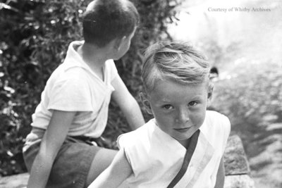 Two Unidentified Children Sitting By A River, c.1936