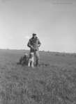 Unidentified Man and Dogs, May 7, 1950