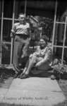 Unidentified Man standing with Woman in Uniform, c.1940s