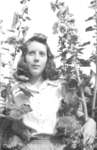 Unidentified Child in Flowers, c.1945