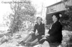 Unidentified Women Sitting By A Lake, April 27, 1941