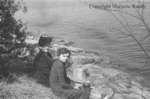 Unidentified Women Sitting By A Lake, April 27, 1941