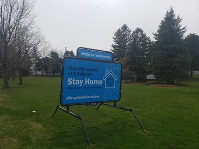 Stay Home sign at Centennial Park