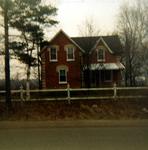 House at southwest corner of Rossland Road and Thickson Road