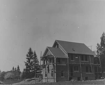 Residence of A. Mansell Irwin surrounded by scaffolding, 1931.