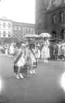Girls with Umbrellas at Orange Parade