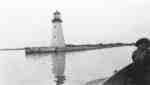 Lighthouse and Pier in Whitby Harbour, c.1920-1926