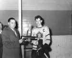 Presentation of Trophy to Elmo Gibson, 1954-1955.