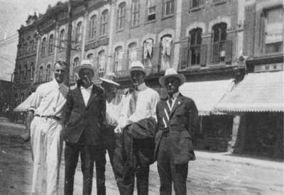 Group of men at Four Corners