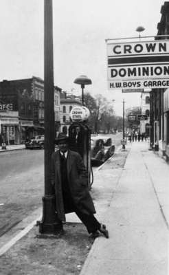 Bill Underwood in front of H.W. Boys Garage