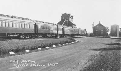 Train at Grain Elevator and Railway Station