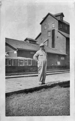 Elwood Masters in front of Grain Elevator