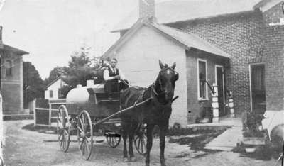 Water Wagon Behind A.C. Elliott Store