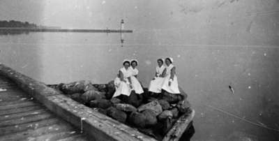 Four Nurses Sitting on Western Breakwater at Whitby Harbour, 1938