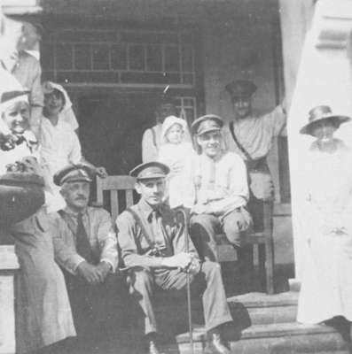 Soldiers, a woman and a child at Military Convalescent Hospital, 1919