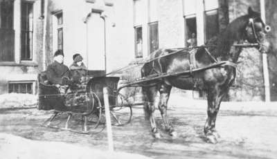 Dr. Charles McGillivray and Miss Annie Allison Maxwell on a Sleigh, 1924