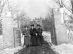 Three students at College Gates, c.1908-1909