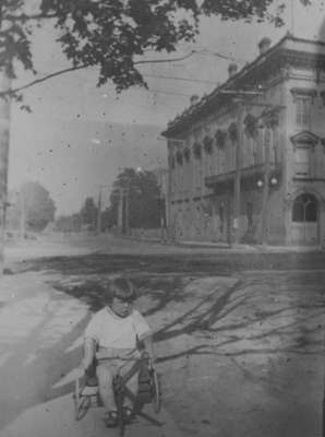 Unidentified Child in front of Town Hall, c.1916