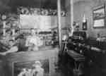 Interior of Ernest Allison's shoe repair shop, 1931