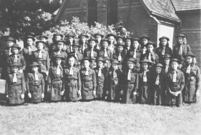 Girl Scouts (Girl Guides) outside All Saints' Parish Hall, June 1946