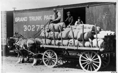 Hatch Manufacturing Company Employees Loading Horse Collars for Shipping (also known as the Buckle Factory), 1912.