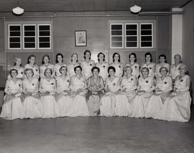 Women in evening gowns.