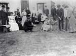 People playing croquet