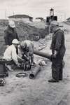 Lucien "Frenchie" Gagne (right) at work