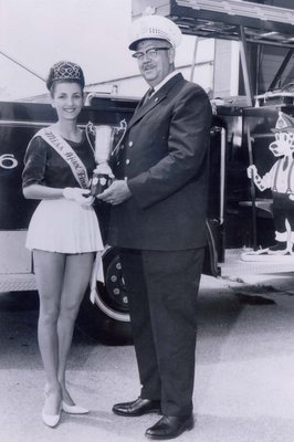 Fire Chief Cam Harris and Miss Ajax Firefighter Mary-Anne Azzopardi