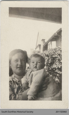 Photo of a Woman With a Child