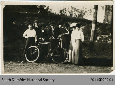 Group of People with Bicycle