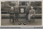 Postcard Depicting Four Men