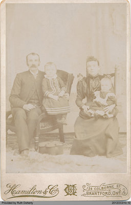 Photograph of Elgin Matthews and Bell Matthews with Hazel and Oscar