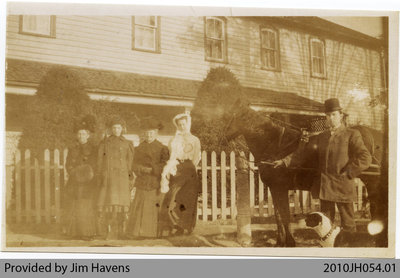 Township Residents in Front of Harley Store