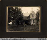 Photograph of Mr. and Mrs. Fred Vivian on Their Farm