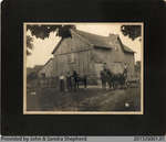 Photograph of Mr. and Mrs. Fred Vivian in Front of Their Barn