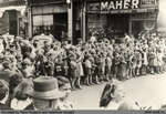 Pupils watching a military parade about 1942