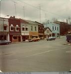 Photograph of Storefronts along Grand River Street
