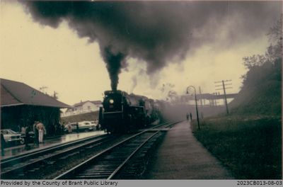 Photograph of a Train Pulling into the Paris Train Station