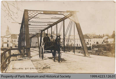 Postcard depicting Penman driving across the William St. Bridge, c. early 20th century