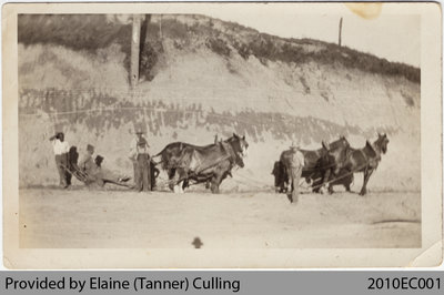 Workers building Highway 24 near Perry German's Farm