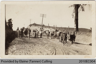 Workers building Highway 24 near Perry German's Farm